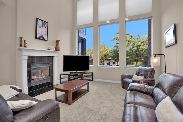 11409 E Zoe Loop Dr, Montgomery, TX 77316 - carpeted living room with a fireplace, healthy amount of natural light, and baseboards