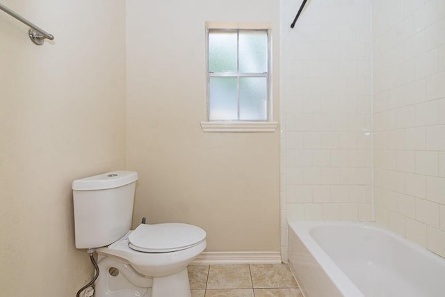1103 Suwanee Ln, Houston, TX 77090 - bathroom featuring toilet, baseboards, and tile patterned floors