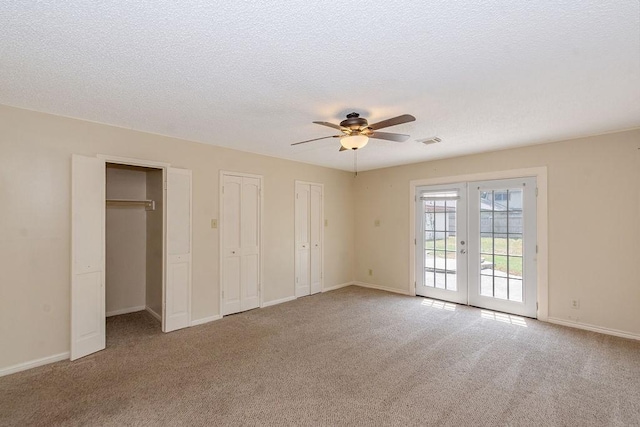 1103 Suwanee Ln, Houston, TX 77090 - unfurnished bedroom featuring french doors, visible vents, access to outside, and carpet flooring