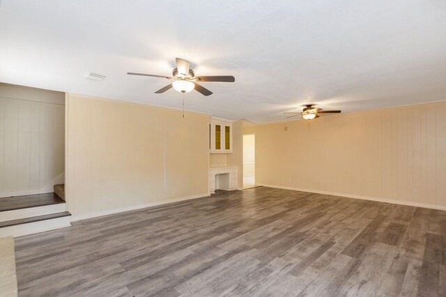 1103 Suwanee Ln, Houston, TX 77090 - unfurnished living room featuring stairway, baseboards, a ceiling fan, and wood finished floors