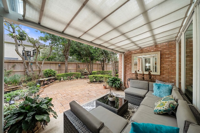 view of patio featuring a fenced backyard and an outdoor hangout area