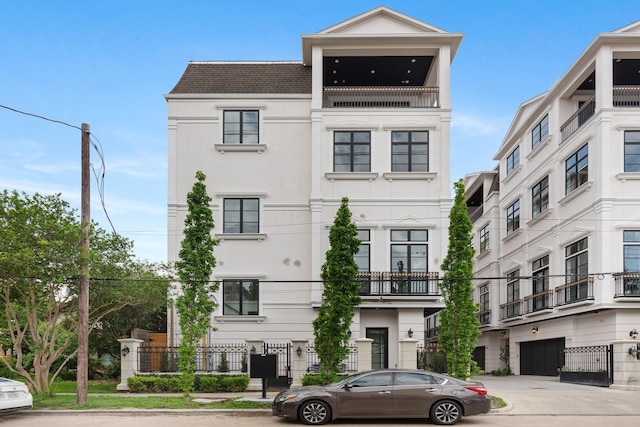 1323 Peden St, Houston, TX 77006 - view of property with a garage