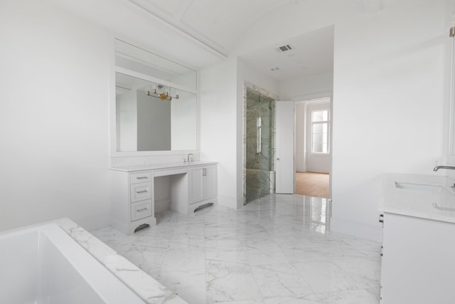 1323 Peden St, Houston, TX 77006 - bathroom with a tub to relax in, marble finish floor, a marble finish shower, a sink, and two vanities