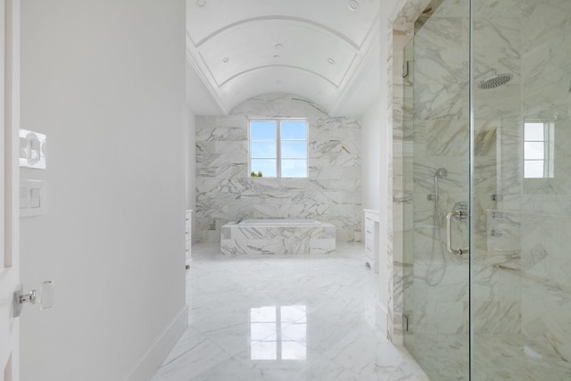 1323 Peden St, Houston, TX 77006 - full bath with lofted ceiling, a garden tub, marble finish floor, and a marble finish shower