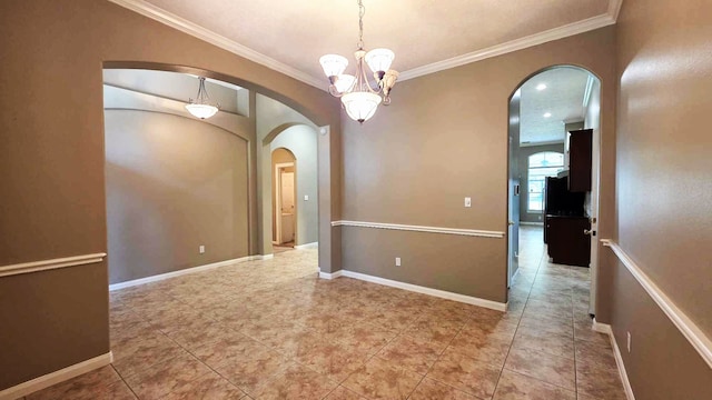 tiled spare room featuring crown molding, a notable chandelier, baseboards, and arched walkways