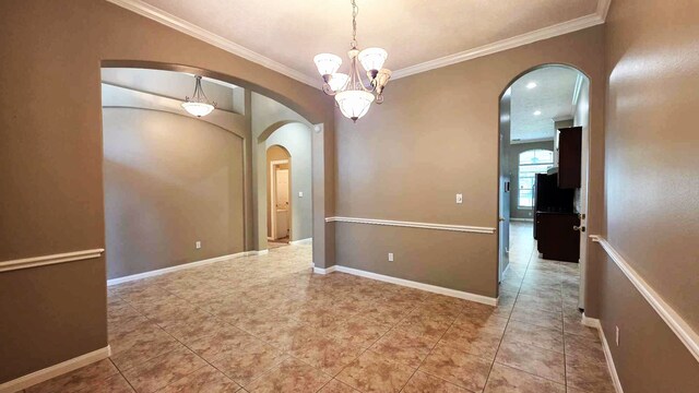8931 Pine Shores Dr, Humble, TX 77346 - tiled empty room with arched walkways, ornamental molding, and a chandelier