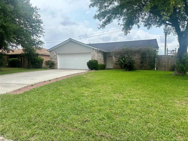 8818 Fern Valley Dr, Houston, TX 77044 - single story home with brick siding, driveway, and a garage