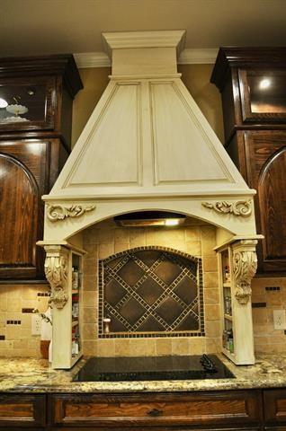 details with light stone counters, dark brown cabinetry, ornamental molding, and tasteful backsplash