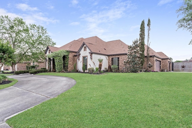 101 Sir Cameron, Lumberton, TX 77657 - french provincial home with curved driveway and brick siding