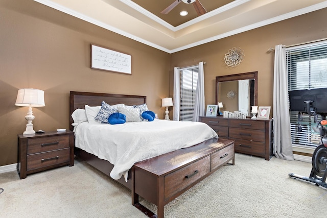 101 Sir Cameron, Lumberton, TX 77657 - bedroom with light carpet, ornamental molding, a tray ceiling, a ceiling fan, and baseboards