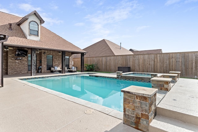101 Sir Cameron, Lumberton, TX 77657 - view of swimming pool featuring a patio area, a fenced backyard, and a pool with connected hot tub