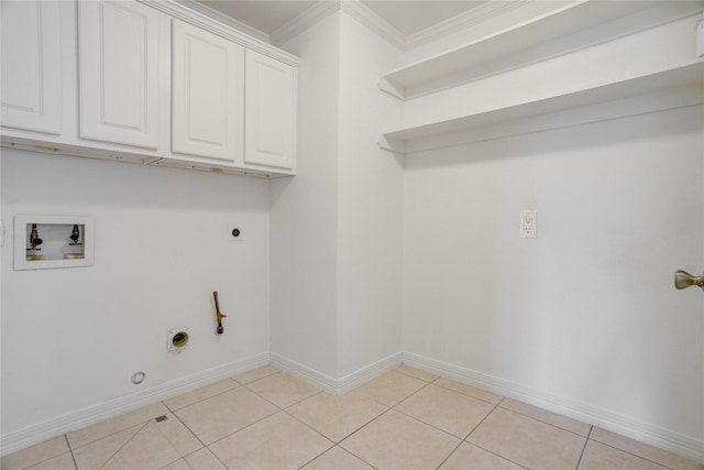 laundry room with hookup for a washing machine, hookup for an electric dryer, cabinet space, ornamental molding, and hookup for a gas dryer