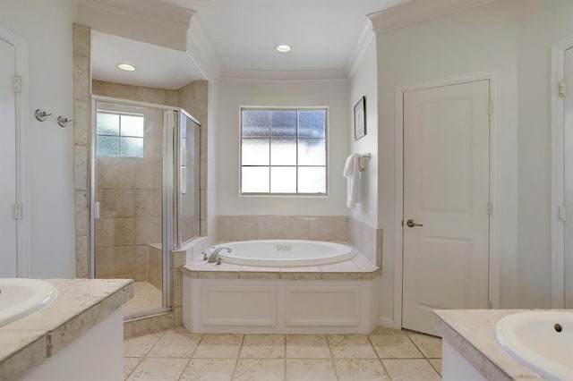 full bath with a bath, vanity, a shower stall, and ornamental molding