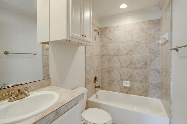 bathroom with shower / bathing tub combination, vanity, ornamental molding, and toilet
