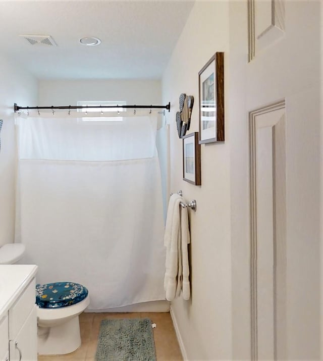 full bath with vanity, a shower with curtain, toilet, tile patterned flooring, and visible vents