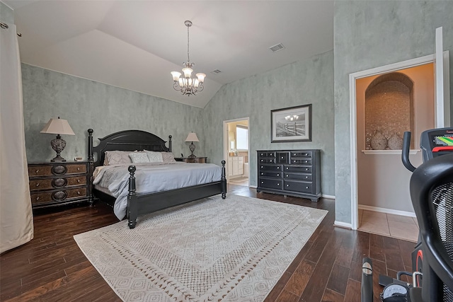 bedroom featuring a chandelier, visible vents, hardwood / wood-style floors, baseboards, and vaulted ceiling