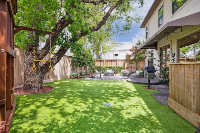 view of yard featuring a fenced backyard and a patio area