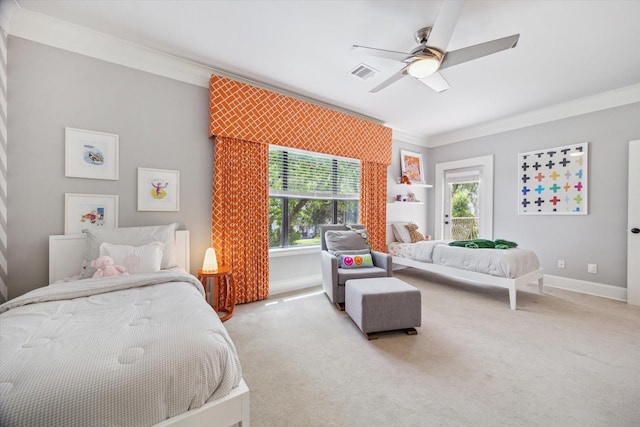 bedroom with visible vents, carpet, crown molding, and baseboards