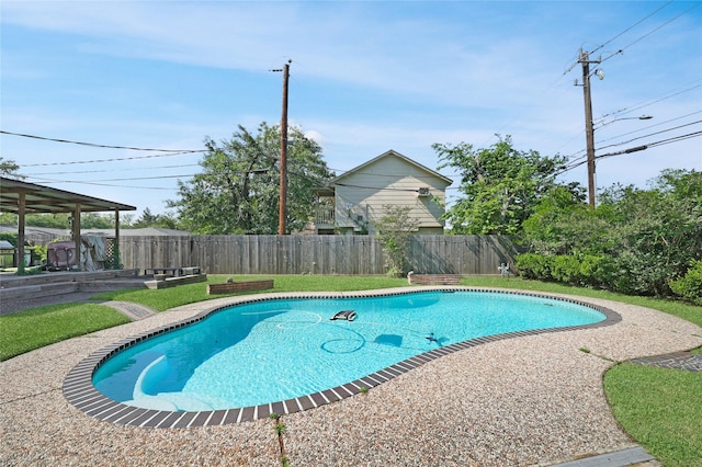 view of pool featuring a fenced in pool and a fenced backyard