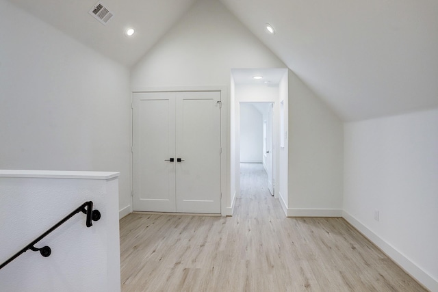 bonus room with recessed lighting, vaulted ceiling, visible vents, and light wood finished floors