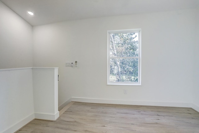7407 Rusk St Unit B, Houston, TX 77011 - spare room with light wood-style flooring, baseboards, and recessed lighting