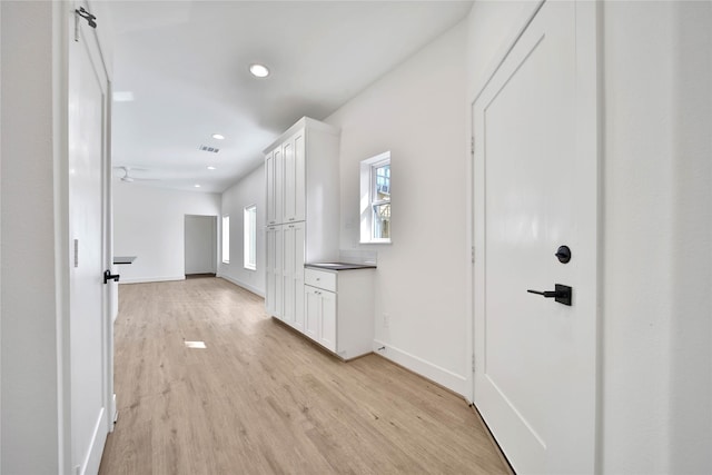 7407 Rusk St Unit B, Houston, TX 77011 - corridor featuring recessed lighting, baseboards, visible vents, and light wood-type flooring