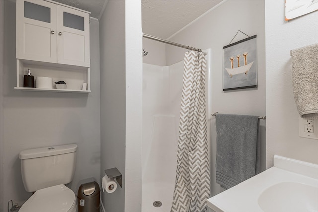 full bathroom featuring a shower stall and toilet