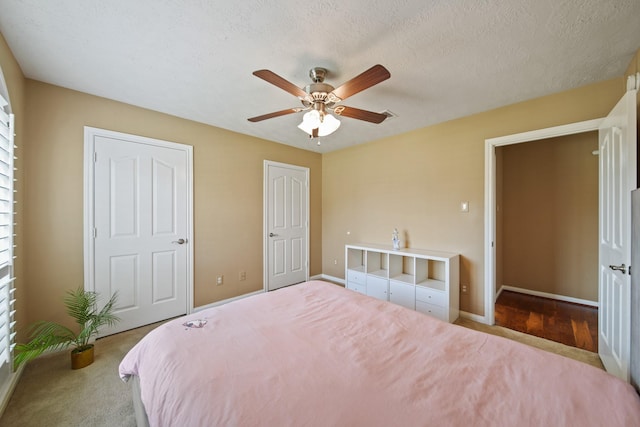 1704 Tempe St, League City, TX 77573 - bedroom with carpet flooring, baseboards, and a ceiling fan