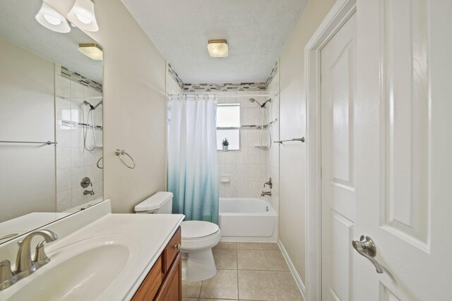 1704 Tempe St, League City, TX 77573 - bathroom with shower / tub combo with curtain, tile patterned flooring, vanity, and toilet