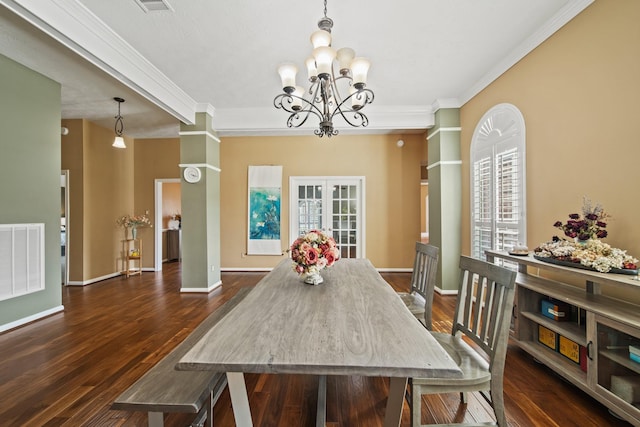 1704 Tempe St, League City, TX 77573 - dining room featuring a chandelier, dark wood-style flooring, crown molding, and baseboards