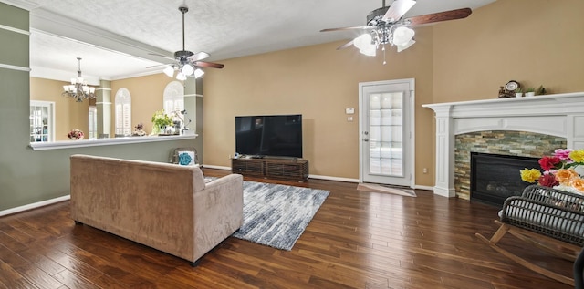 1704 Tempe St, League City, TX 77573 - living area with ceiling fan, wood-type flooring, a chandelier, and a fireplace