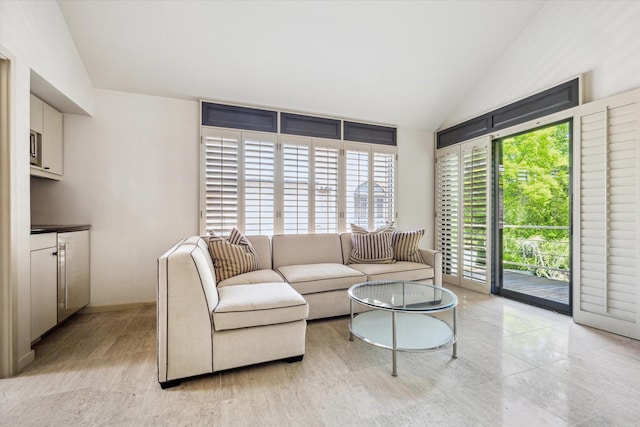 living room with vaulted ceiling