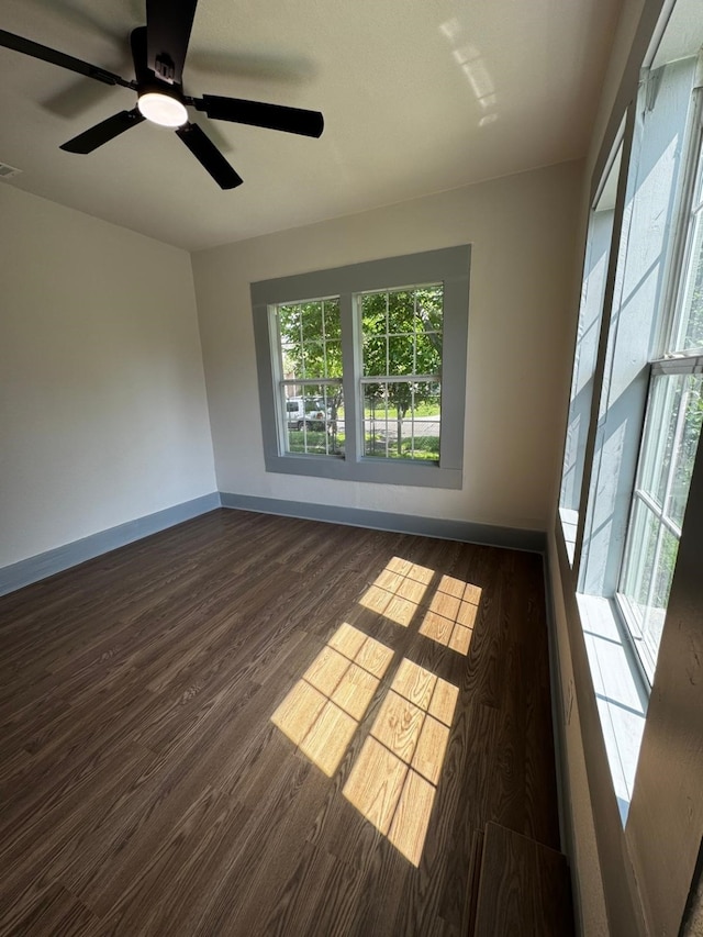 3401 Illinois St, Baytown, TX 77520 - empty room with wood finished floors, visible vents, baseboards, and ceiling fan
