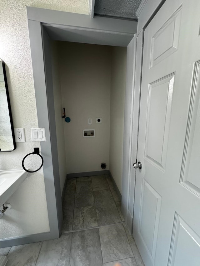 3401 Illinois St, Baytown, TX 77520 - laundry room featuring electric dryer hookup and washer hookup