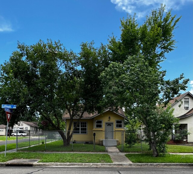 3401 Illinois St, Baytown, TX 77520 - view of front facade with a fenced front yard and a gate