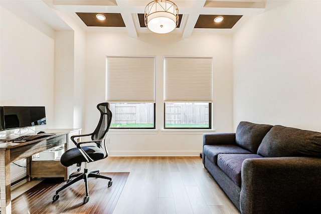 office space with baseboards, beam ceiling, wood finished floors, and coffered ceiling