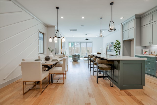 dining area featuring light wood-style flooring, visible vents, and recessed lighting