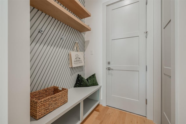 mudroom with light wood finished floors
