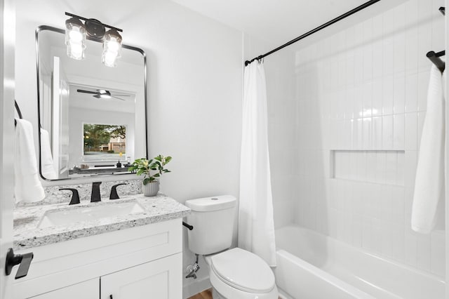bathroom featuring shower / bath combination with curtain, toilet, and vanity