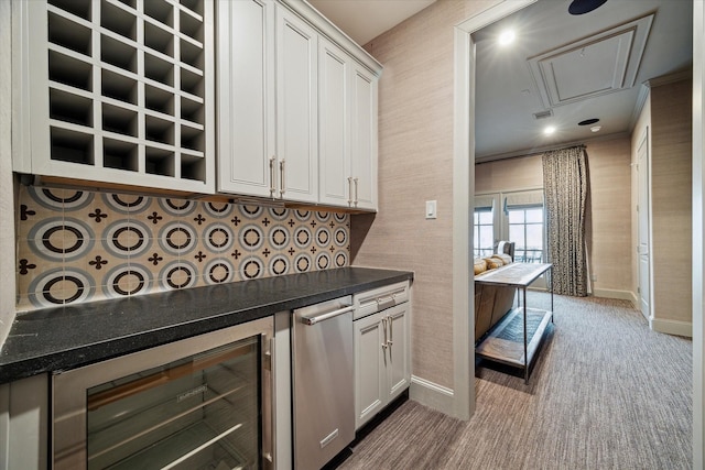 305 Royale Heights Ln, Houston, TX 77024 - bar with backsplash, baseboards, carpet flooring, and wine cooler