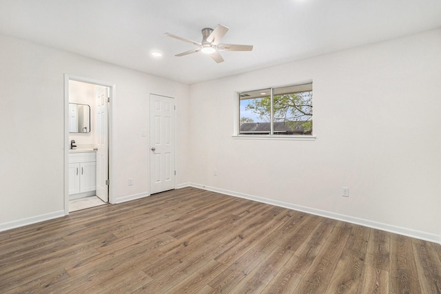 1510 Tarberry Rd, Houston, TX 77088 - empty room featuring ceiling fan, baseboards, wood finished floors, and recessed lighting