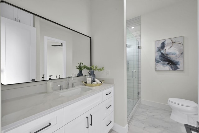 full bathroom with marble finish floor, toilet, vanity, baseboards, and a stall shower