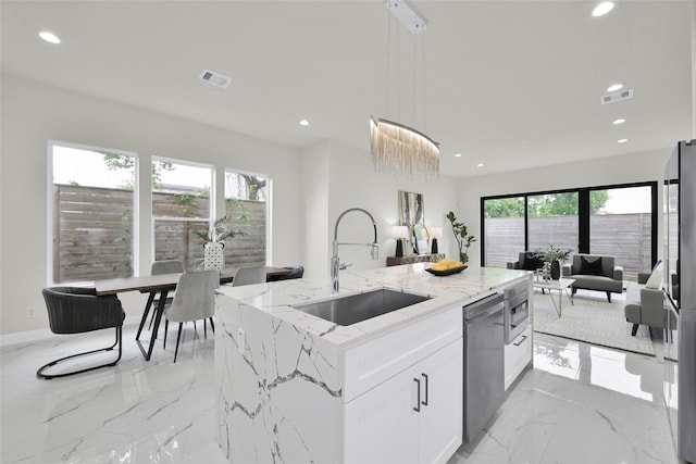 kitchen featuring recessed lighting, a sink, marble finish floor, visible vents, and appliances with stainless steel finishes