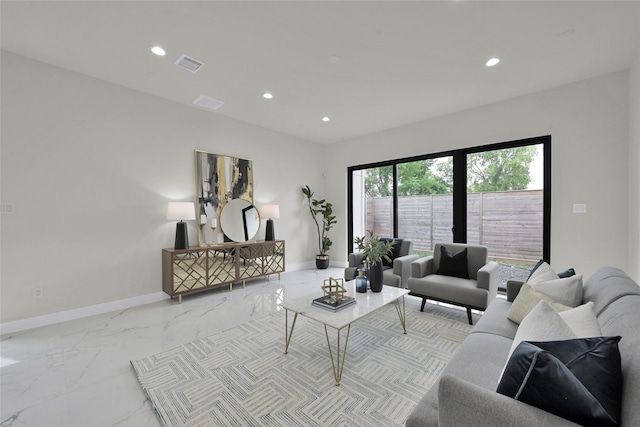 living room featuring baseboards, visible vents, marble finish floor, and recessed lighting
