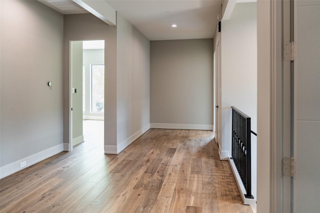 2222 Branard St, Houston, TX 77098 - unfurnished living room with recessed lighting, light wood-style flooring, and baseboards