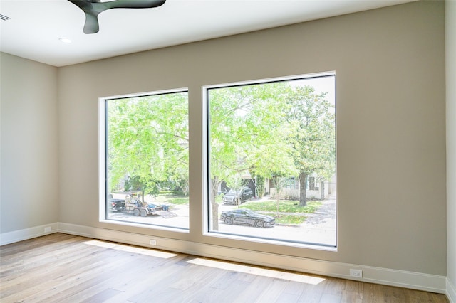 2222 Branard St, Houston, TX 77098 - spare room with wood finished floors, a ceiling fan, recessed lighting, and baseboards