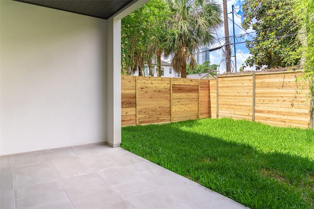 2222 Branard St, Houston, TX 77098 - view of yard featuring a fenced backyard and a patio area