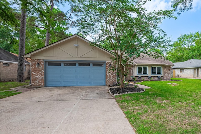 14823 Forest Lodge Dr, Houston, TX 77070 - ranch-style home with a garage, concrete driveway, a front lawn, and brick siding