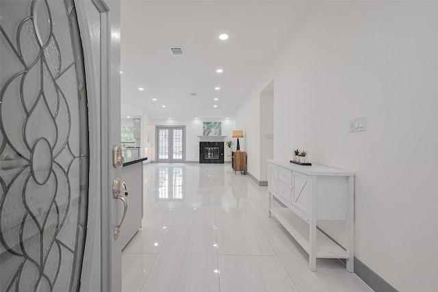 14823 Forest Lodge Dr, Houston, TX 77070 - corridor featuring visible vents, recessed lighting, baseboards, and light tile patterned floors