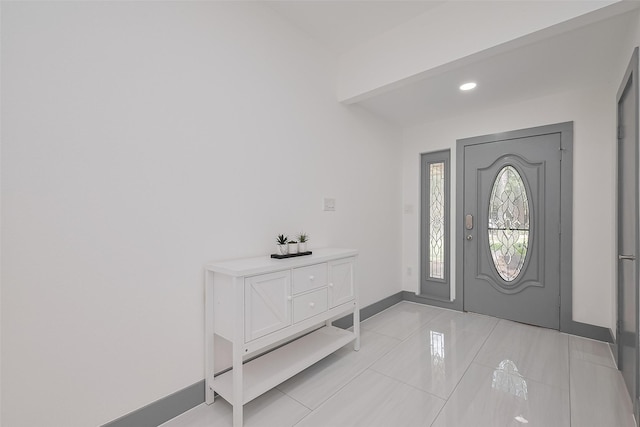14823 Forest Lodge Dr, Houston, TX 77070 - entrance foyer featuring light tile patterned floors, baseboards, and recessed lighting